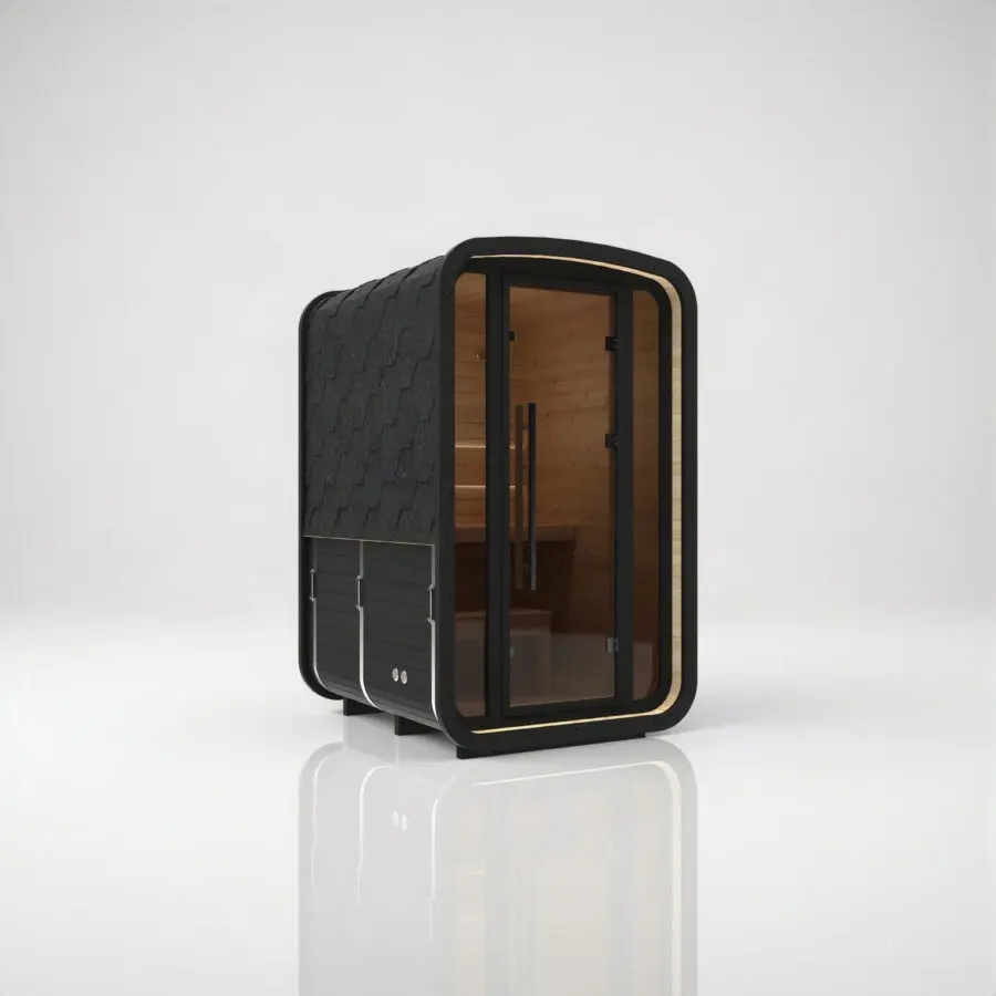 Hekla Mini Cube Nero outdoor sauna, front-left three-quarter view in black-stained thermo spruce with black shingle roof